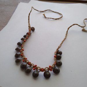 Islander handcrafted seasnail bead orange braded rope necklace